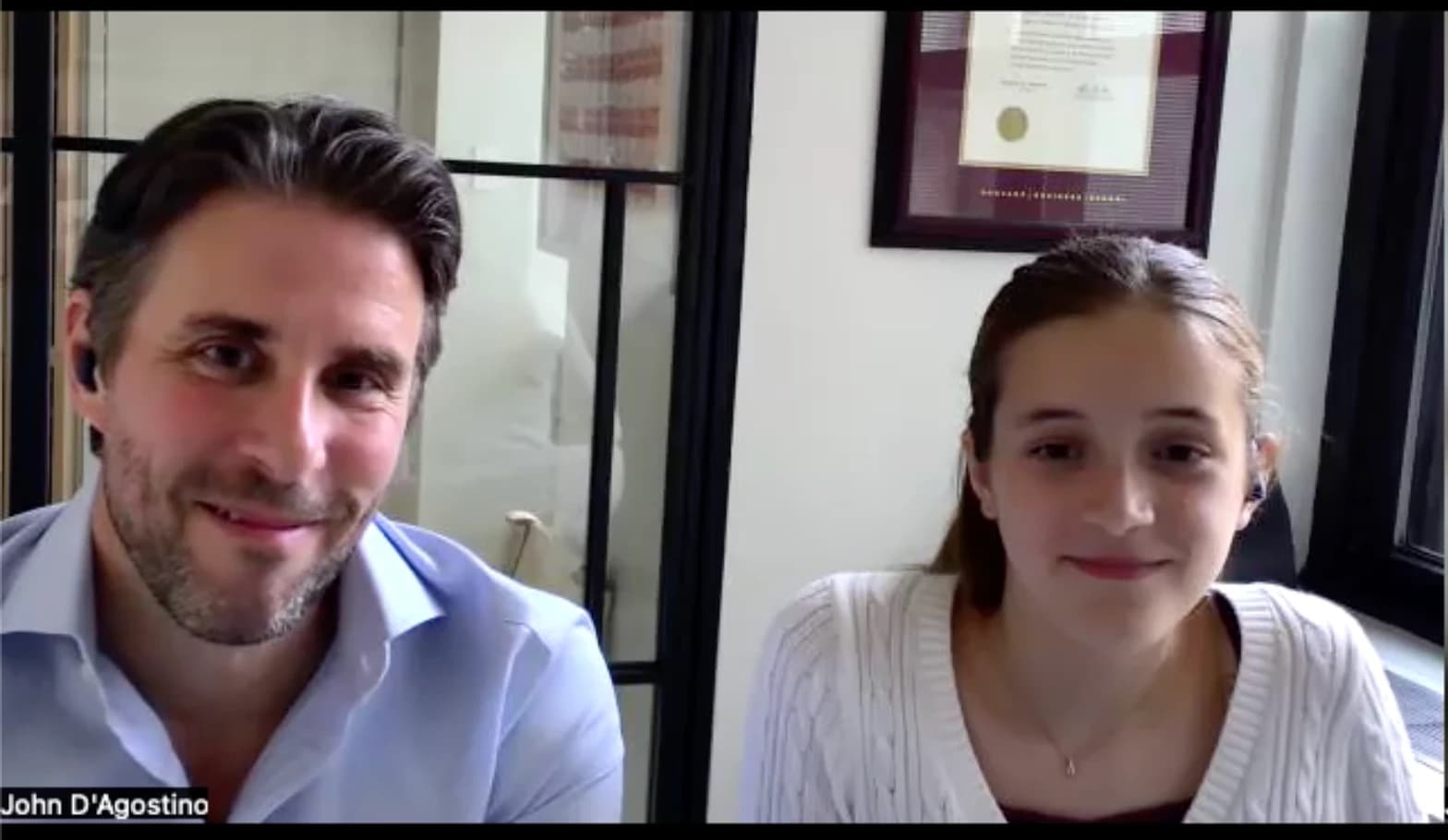 A parent and daughter on a Career Day video call